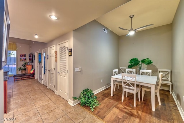 150 Las Vegas Blvd Unit 1606, Las Vegas, NV 89101 - dining space featuring baseboards, a ceiling fan, light tile patterned flooring, and visible vents