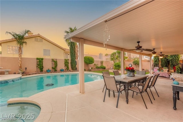 3950 Candleglow Ct, Las Vegas, NV 89147 - view of swimming pool with ceiling fan, a fenced in pool, a fenced backyard, a patio, and outdoor dining space