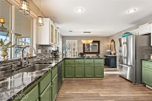 3950 Candleglow Ct, Las Vegas, NV 89147 - kitchen with a sink, white cabinetry, appliances with stainless steel finishes, and green cabinets