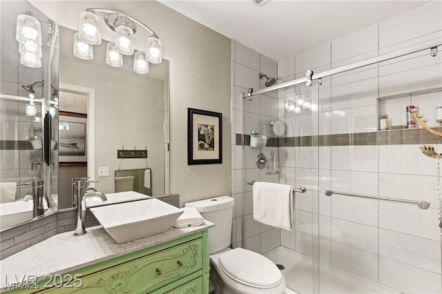 3950 Candleglow Ct, Las Vegas, NV 89147 - bathroom with vanity, toilet, and a shower stall