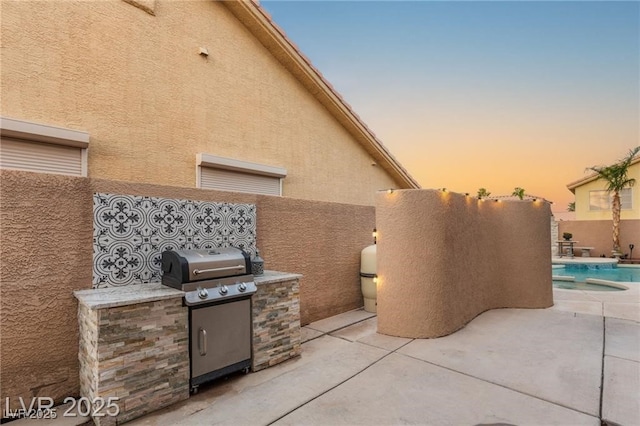 3950 Candleglow Ct, Las Vegas, NV 89147 - patio terrace at dusk featuring a fenced in pool