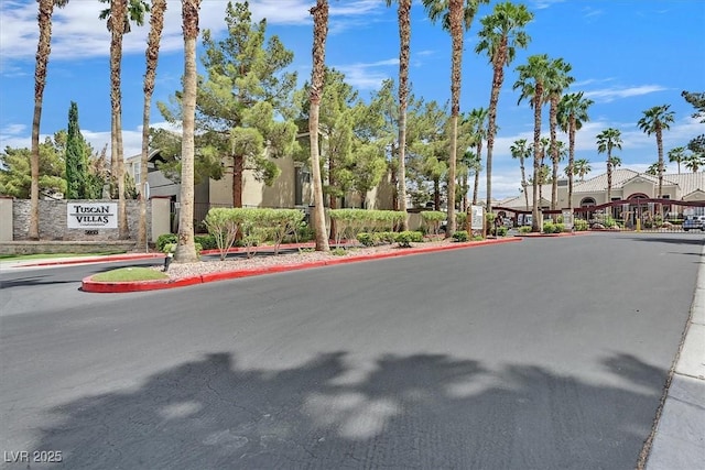 view of street featuring curbs