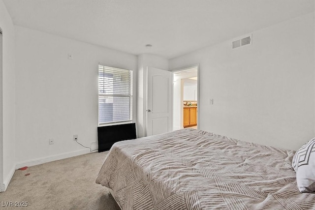 bedroom with visible vents, carpet flooring, and baseboards