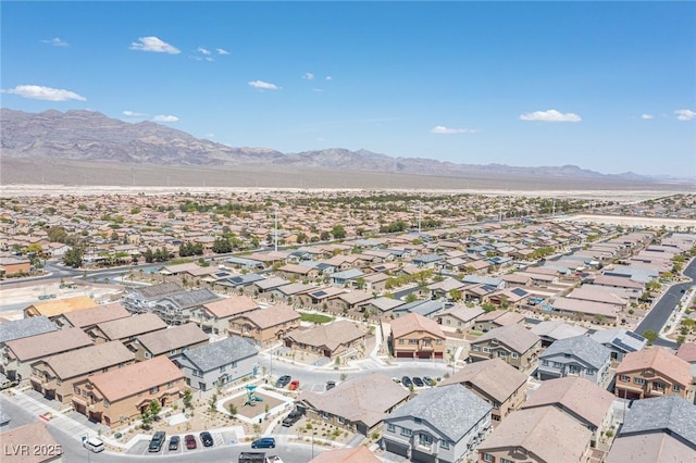 aerial view featuring a mountain view and a residential view