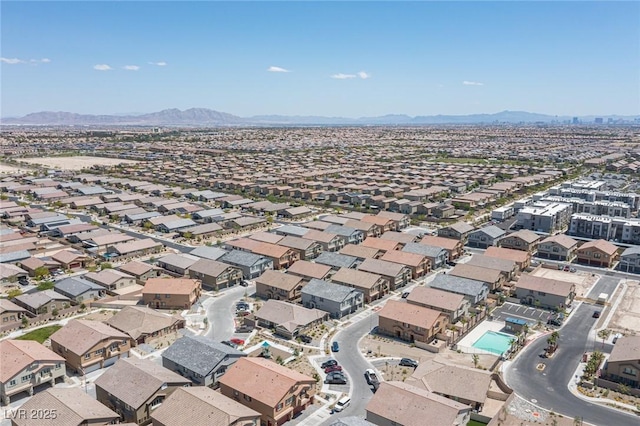 drone / aerial view featuring a mountain view and a residential view