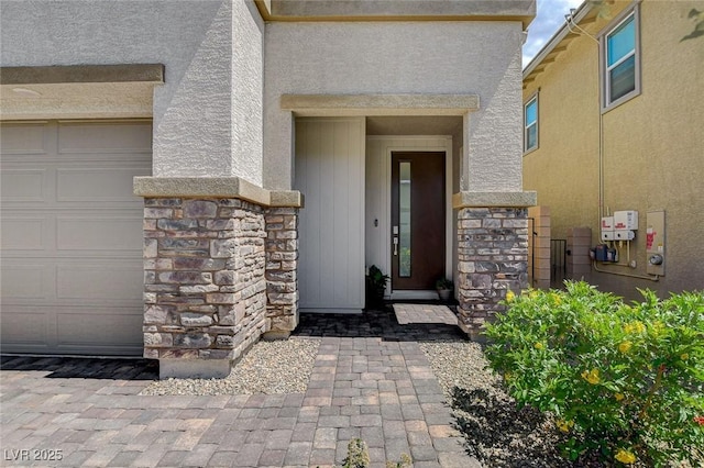 8898 Sasquatch Run Ave, Las Vegas, NV 89166 - entrance to property featuring stone siding and stucco siding