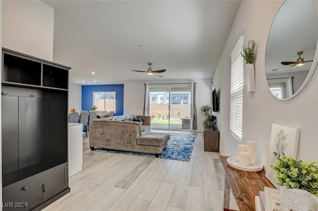 8898 Sasquatch Run Ave, Las Vegas, NV 89166 - living room featuring light wood-style floors and a ceiling fan