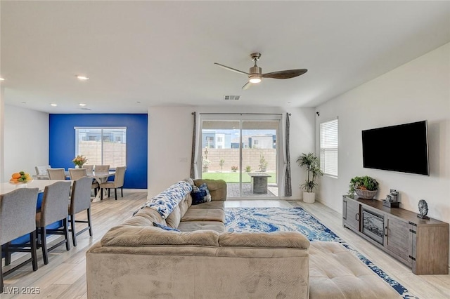 8898 Sasquatch Run Ave, Las Vegas, NV 89166 - living room featuring visible vents, a ceiling fan, plenty of natural light, and recessed lighting