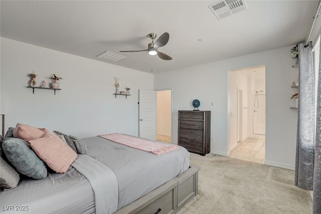 8898 Sasquatch Run Ave, Las Vegas, NV 89166 - bedroom featuring light colored carpet, ceiling fan, visible vents, and ensuite bathroom