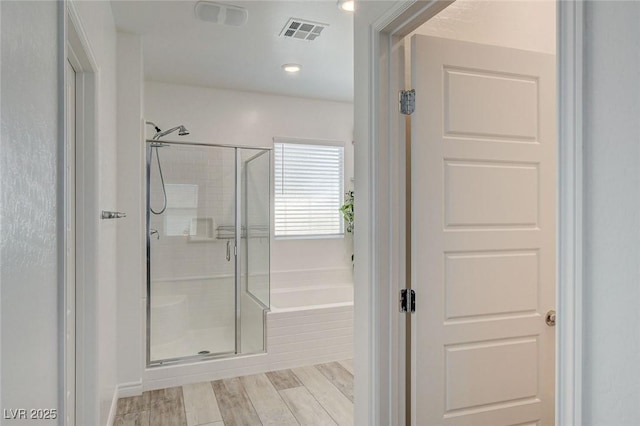 8898 Sasquatch Run Ave, Las Vegas, NV 89166 - bathroom with a stall shower, a bath, and visible vents