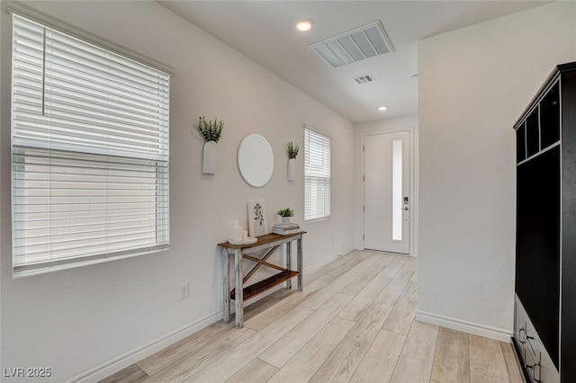 8898 Sasquatch Run Ave, Las Vegas, NV 89166 - foyer with visible vents, recessed lighting, light wood-style floors, and baseboards