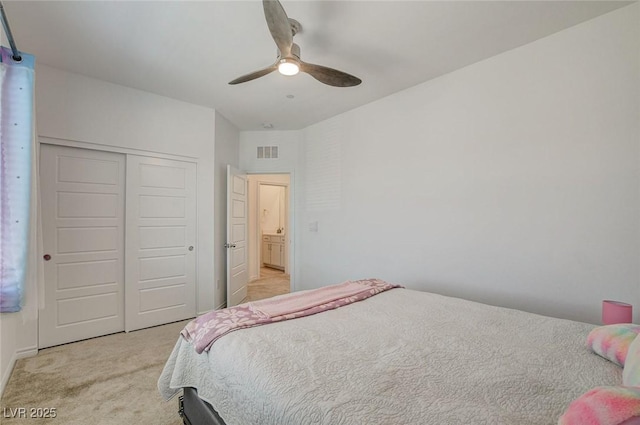 8898 Sasquatch Run Ave, Las Vegas, NV 89166 - bedroom featuring a ceiling fan, visible vents, light colored carpet, baseboards, and a closet