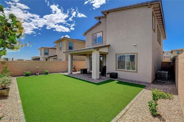 8898 Sasquatch Run Ave, Las Vegas, NV 89166 - back of property with a fenced backyard, a patio, stucco siding, and cooling unit