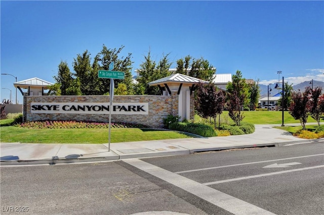 8898 Sasquatch Run Ave, Las Vegas, NV 89166 - community sign with a yard