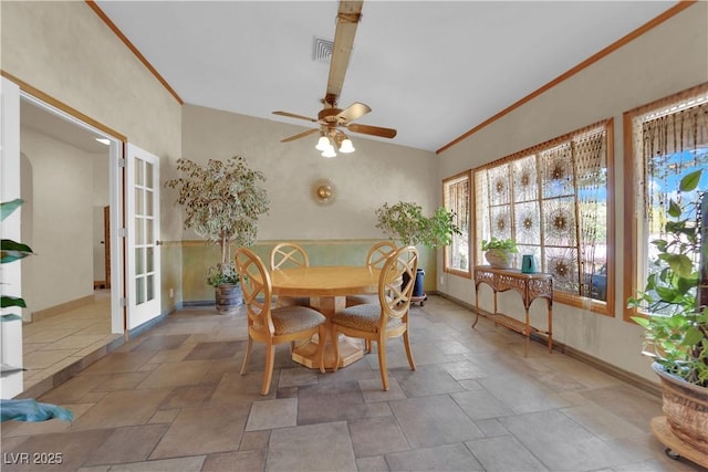 3065 S Torrey Pines Dr, Las Vegas, NV 89146 - dining room with baseboards, a ceiling fan, stone finish floors, and ornamental molding