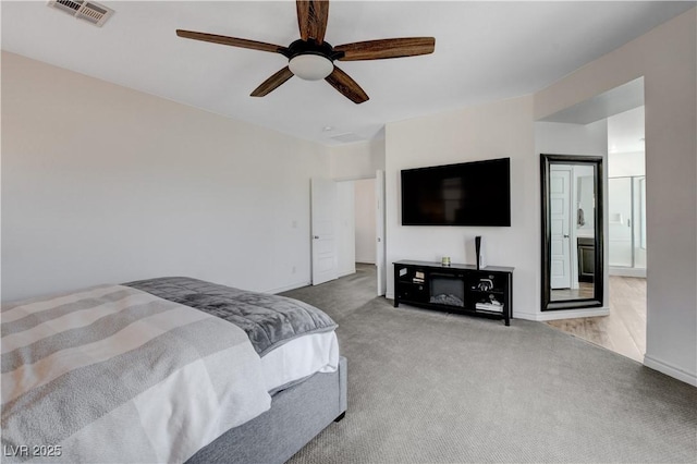 bedroom with visible vents, carpet flooring, baseboards, and a ceiling fan