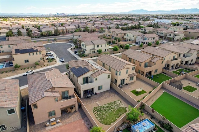 aerial view featuring a residential view and a mountain view