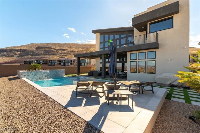 5436 Succulent Rose Dr, Las Vegas, NV 89135 - pool featuring a patio, fence, and a mountain view