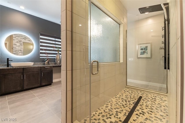 5436 Succulent Rose Dr, Las Vegas, NV 89135 - full bathroom featuring vanity, tile patterned floors, and a stall shower