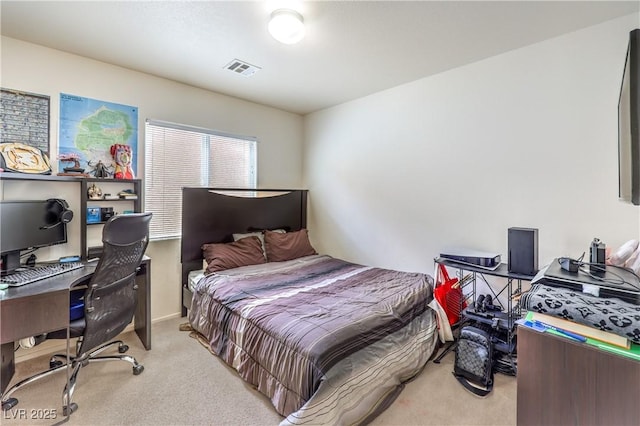 bedroom with carpet and visible vents