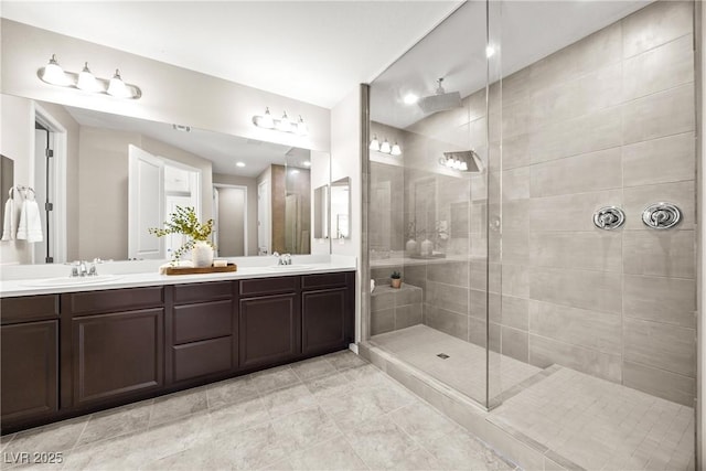 12705 Coastline Shadow St, Las Vegas, NV 89141 - bathroom featuring double vanity, walk in shower, and tile patterned floors