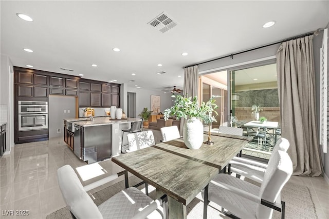 12705 Coastline Shadow St, Las Vegas, NV 89141 - dining area with recessed lighting, ceiling fan, and light tile patterned floors