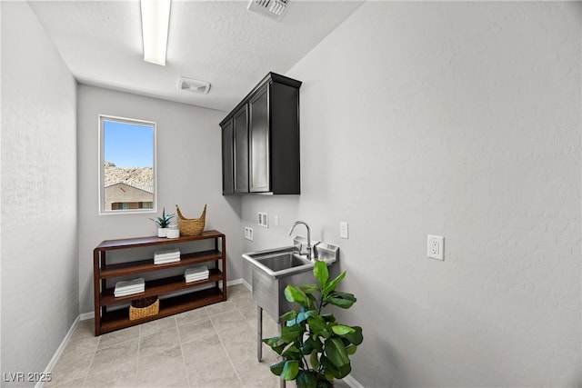 12705 Coastline Shadow St, Las Vegas, NV 89141 - hall featuring a sink and baseboards