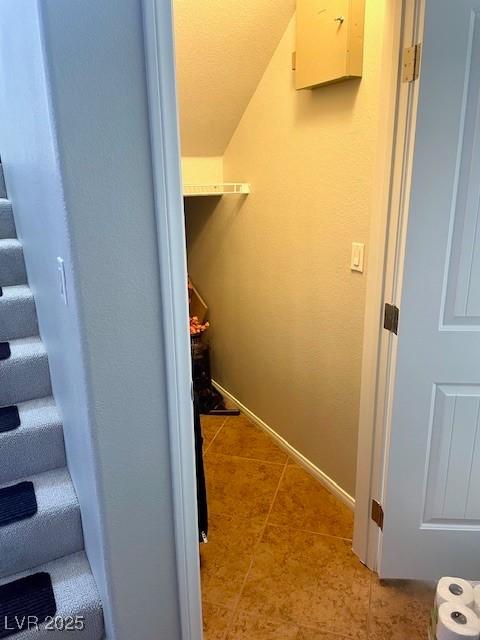 interior space featuring baseboards