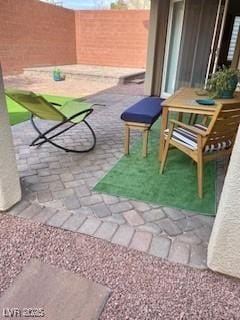 view of patio / terrace with fence