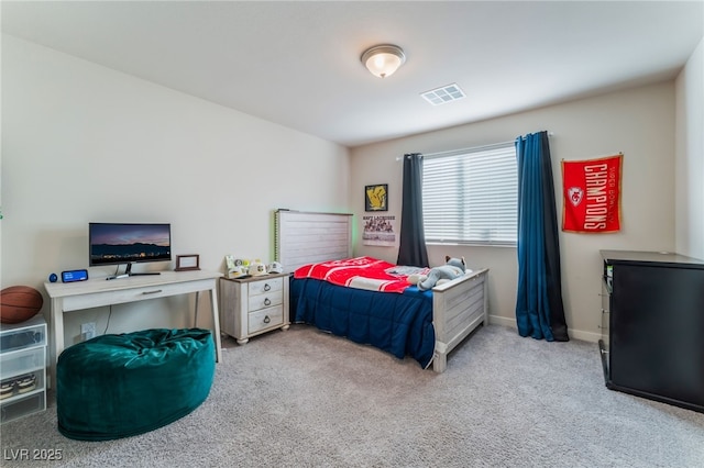 bedroom with baseboards, carpet, and visible vents
