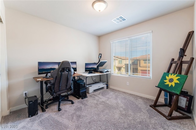 carpeted home office with baseboards and visible vents