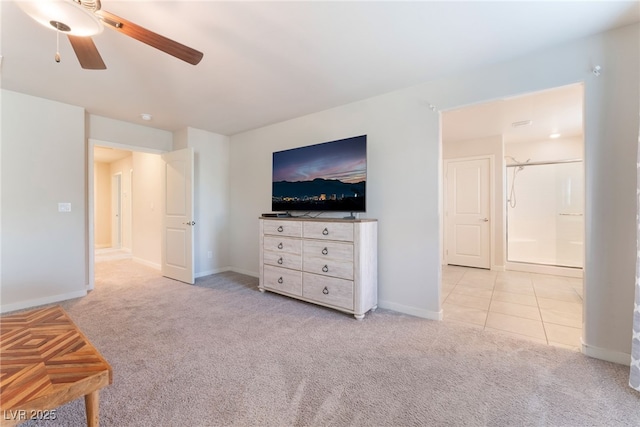 bedroom featuring baseboards, ceiling fan, and light colored carpet