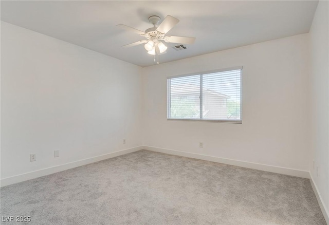 8824 Charm Canyon Ave, Las Vegas, NV 89178 - spare room with carpet floors, baseboards, and ceiling fan