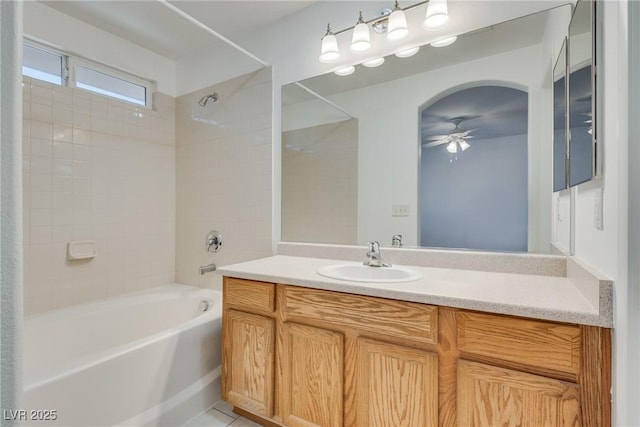 8824 Charm Canyon Ave, Las Vegas, NV 89178 - bathroom featuring vanity, a ceiling fan, and tub / shower combination