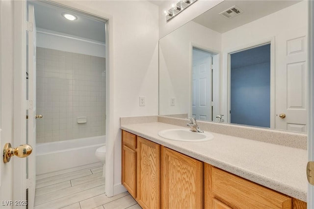 8824 Charm Canyon Ave, Las Vegas, NV 89178 - full bathroom with vanity, toilet,  shower combination, and visible vents