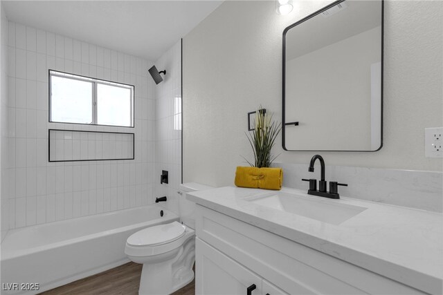 1424 Balzar Ave, Las Vegas, NV 89106 - full bath featuring wood finished floors, toilet, bathtub / shower combination, and vanity