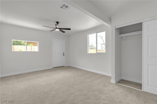 1424 Balzar Ave, Las Vegas, NV 89106 - unfurnished bedroom with multiple windows, carpet floors, baseboards, and ceiling fan