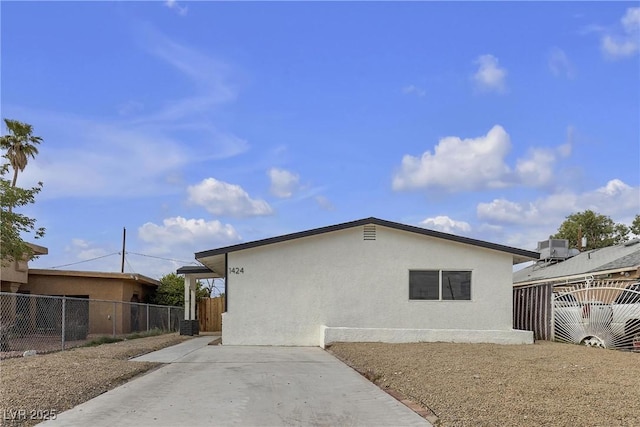 1424 Balzar Ave, Las Vegas, NV 89106 - back of property with stucco siding and fence