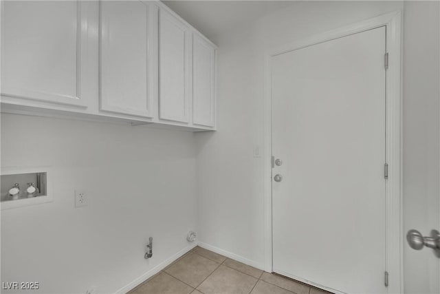 6525 Bismark Hills St, North Las Vegas, NV 89084 - laundry area featuring cabinet space, washer hookup, gas dryer hookup, light tile patterned floors, and baseboards