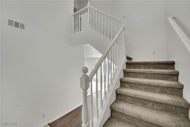 6525 Bismark Hills St, North Las Vegas, NV 89084 - staircase with wood finished floors and baseboards