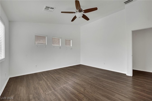 6525 Bismark Hills St, North Las Vegas, NV 89084 - spare room featuring lofted ceiling, a ceiling fan, wood finished floors, plenty of natural light, and baseboards