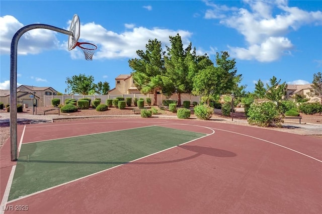 6525 Bismark Hills St, North Las Vegas, NV 89084 - view of sport court with community basketball court and a residential view