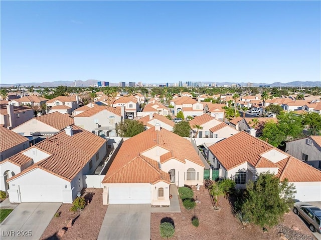 aerial view featuring a residential view and a mountain view