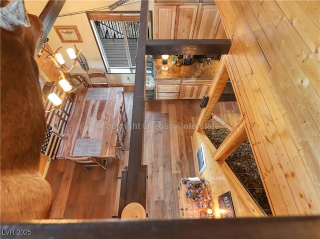 interior space featuring wood-type flooring and stairs