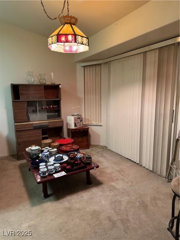 dining space featuring carpet floors