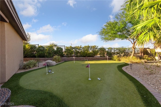 view of property's community with a fenced backyard