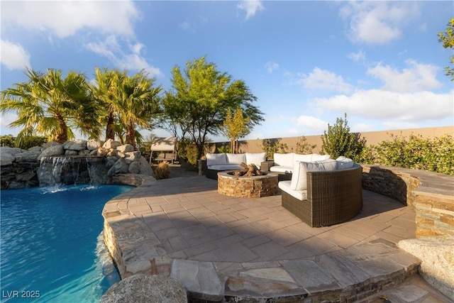 exterior space with a fenced in pool and an outdoor living space with a fire pit