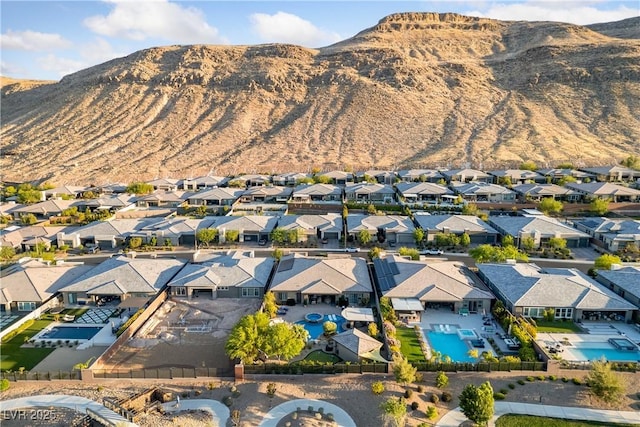 birds eye view of property featuring a residential view and a mountain view