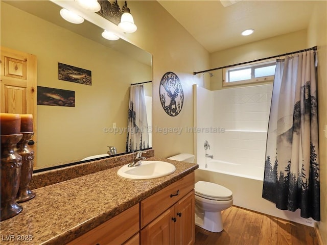 full bath featuring vanity, shower / bathtub combination with curtain, wood finished floors, and toilet