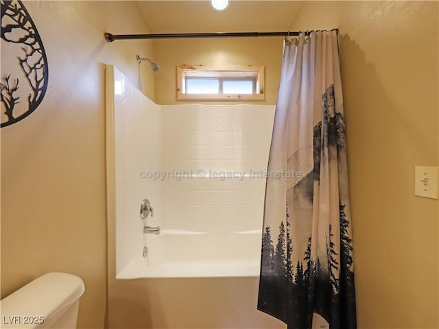 full bathroom with toilet and shower / tub combo with curtain